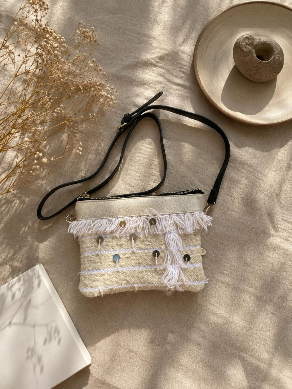Handwoven Moroccan crossbody bag in cream and white with fringe and sequins