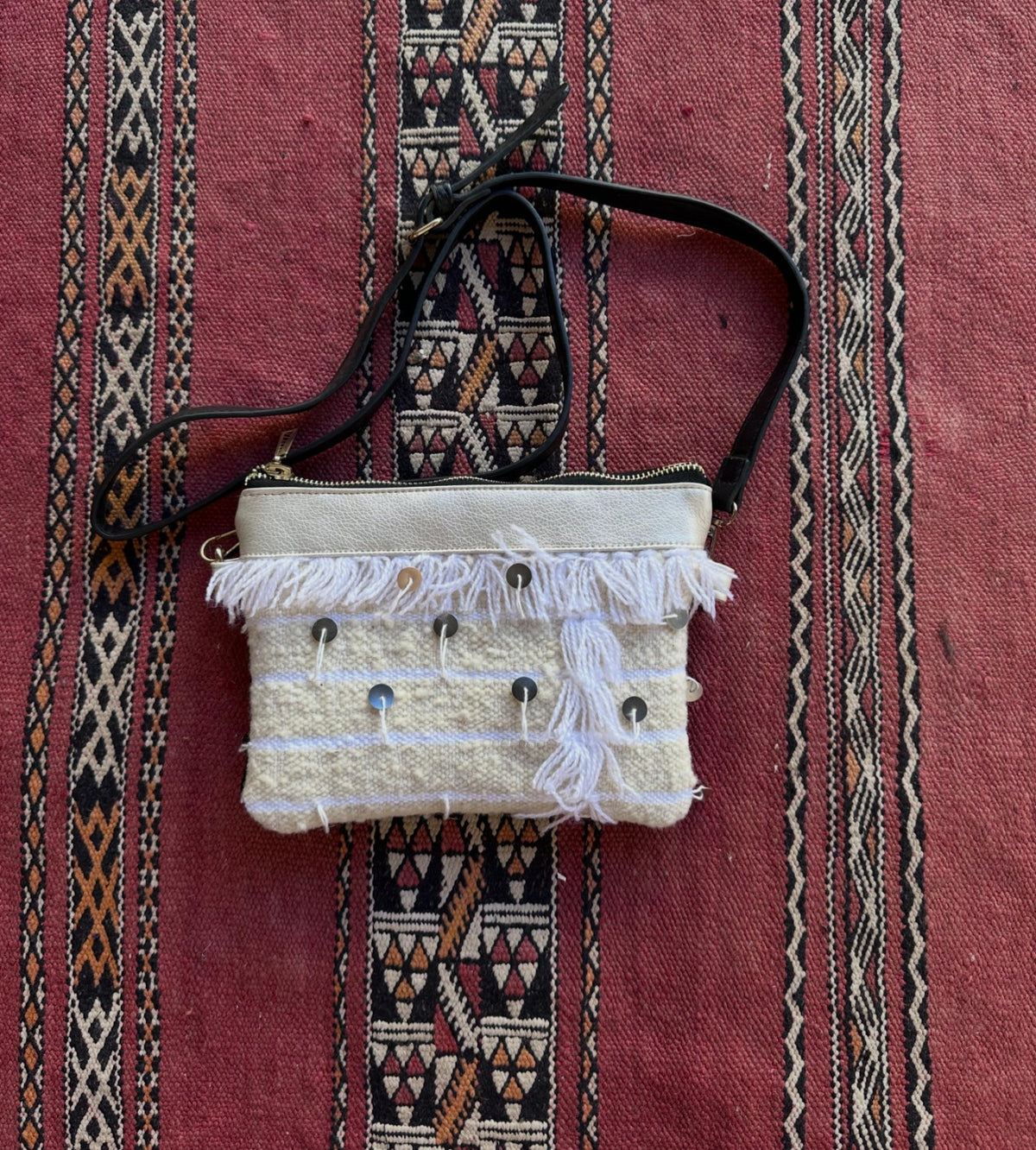 Handwoven Moroccan crossbody bag with traditional Moroccan textile details